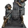 Beautiful polyresin garden statue featuring a boy and girl by a water-feature lamppost.