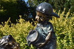 Add charm and allure to your outdoor space with this exquisite garden statue.