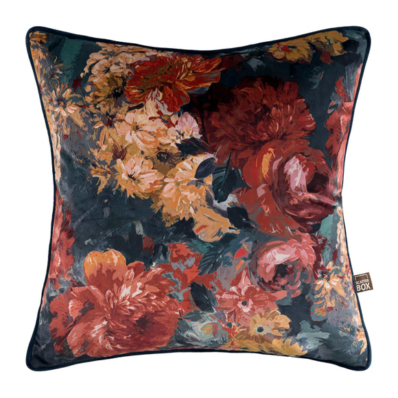 Decorative cushion featuring a navy rust color scheme.