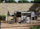 Elevate your outdoor entertaining with the Santorioni Bar Table Garden Set 1 Grey. With 6 garden bar stools and a bar table featuring a firepit, this set combines style and functionality for your garden bar ideas.