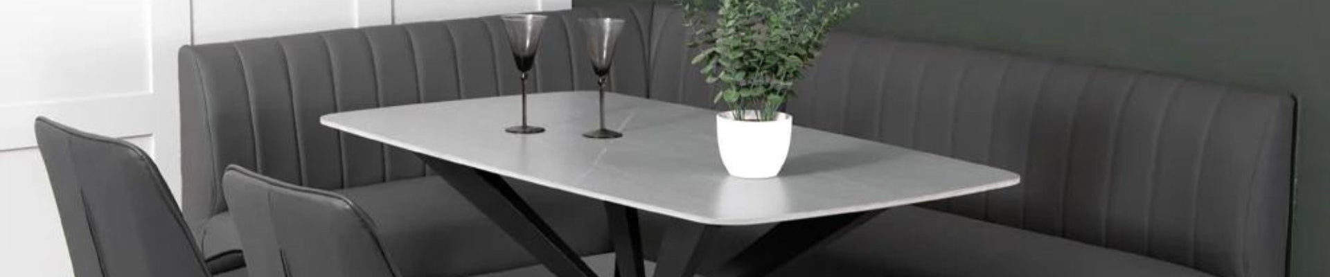 A modern dining bench paired with a stylish dining table in a well-appointed dining room.
