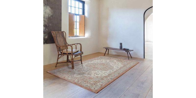 A stunning collection of natural and sustainable rugs, including damask and eco-friendly designs, displayed in various living room and bedroom settings.