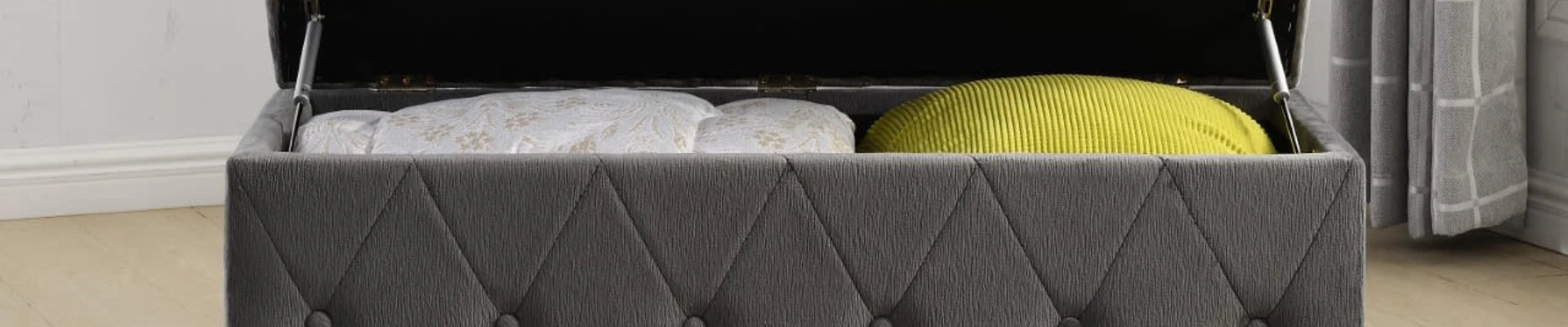 A beautifully arranged room featuring a stylish ottoman blanket box