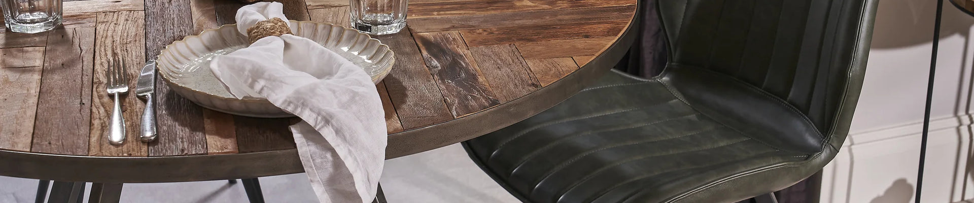 Assortment of leather dining chairs in various colors, perfect for stylish dining spaces