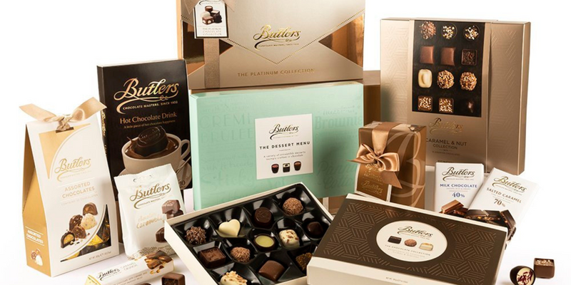 Assorted premium Irish chocolate gifts including truffles, dark and milk chocolate, and Butlers Chocolate in elegant packaging.