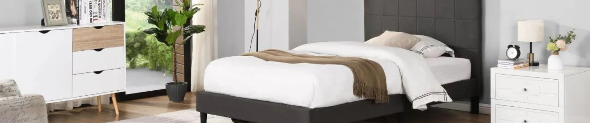 A modern small double bed in a cozy bedroom, featuring a sleek 4ft bed frame