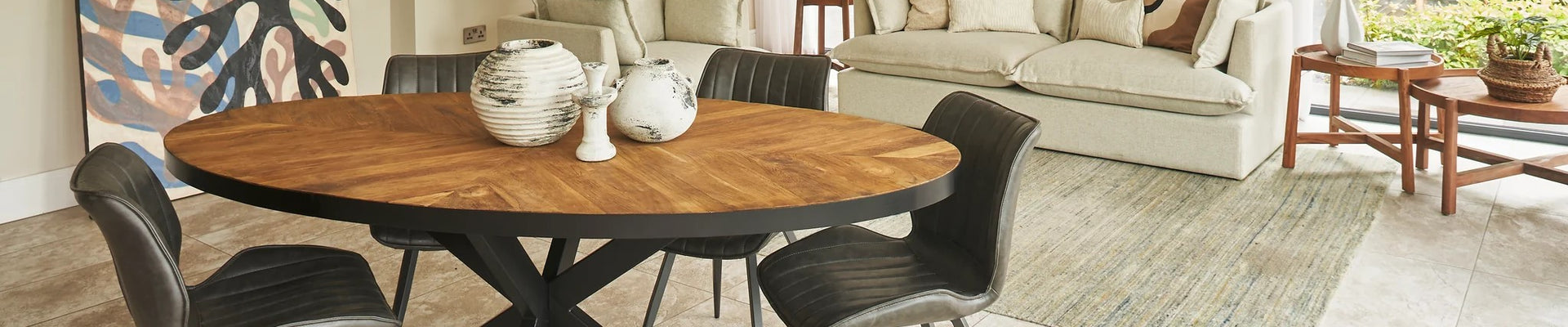 Elegant oval dining tables in various styles including wood, pedestal, and small options, perfect for any dining room or kitchen.