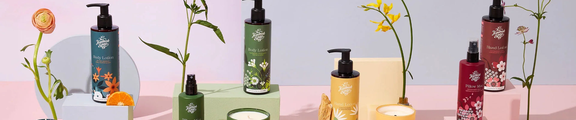 A curated assortment of soap, hand cream, body lotion, bubble bath, shower gel, and lip balm for personal care.