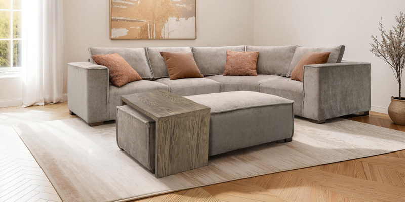 Bodhi Sofa Collection featuring modular sofas and armchairs in a stylish living room setting.