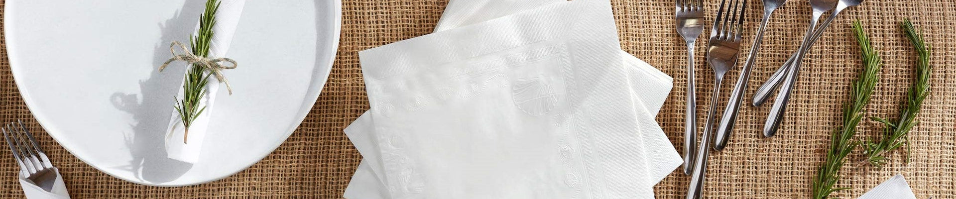 A collection of patterned paper napkins, styled for dining and special occasions.