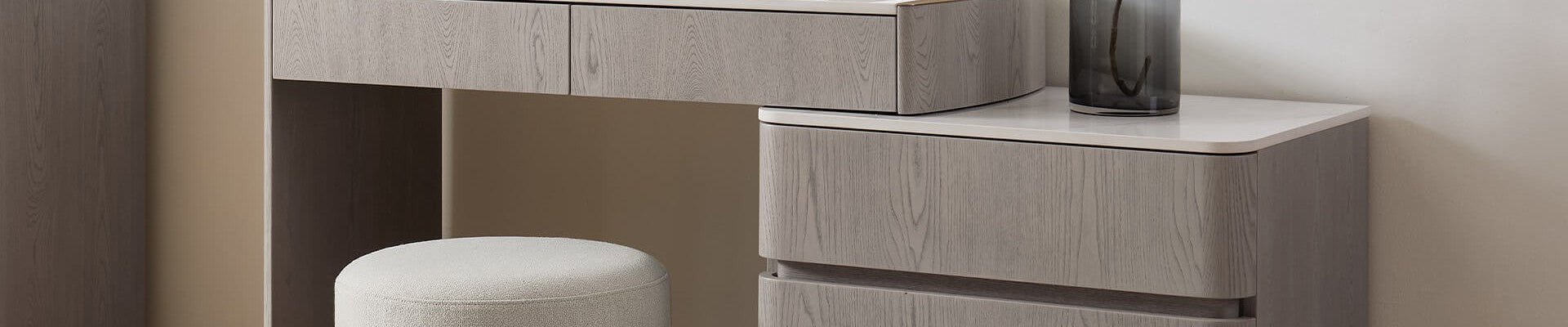 Elegant vanity table with storage drawers and padded stool