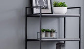 A collection of stylish wooden bookcases and shelving units ideal for home and office organization.