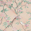 Soft peach wallpaper with floral pattern