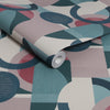 Modern geometric wallpaper in teal and pink tones