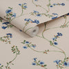 Joules Robey Cottage Floral Creme wallpaper featuring pops of color