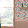 Soft red, blue, and garden green Joules Sanders Ditsy Creme wallpaper