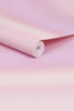 Roll of pink wallpaper on a gradient pink background