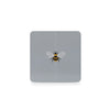 A set of six Tipperary Crystal Bee Coasters neatly arranged on a dining table, adding an elegant touch to the setting.