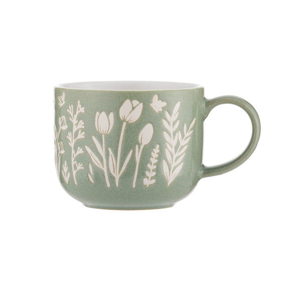 Embrace the beauty of spring with 'The Meadow Green Tulip Mug,' a ceramic masterpiece adorned with vibrant green tulips that evoke the freshness of a blooming meadow.