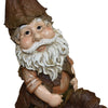 Comical garden gnome with a leaf, ideal for garden spaces.