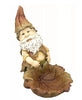 Garden gnome statue holding a leaf - perfect for outdoor decor.