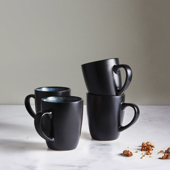 A visual representation of the Simply Home Lisbon 4 Piece Mug Set, showcasing its exquisite patterns and comfortable handles for a delightful sipping experience.