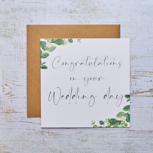 Card extending heartfelt congratulations on your wedding day, a beautiful gesture to celebrate this special milestone.