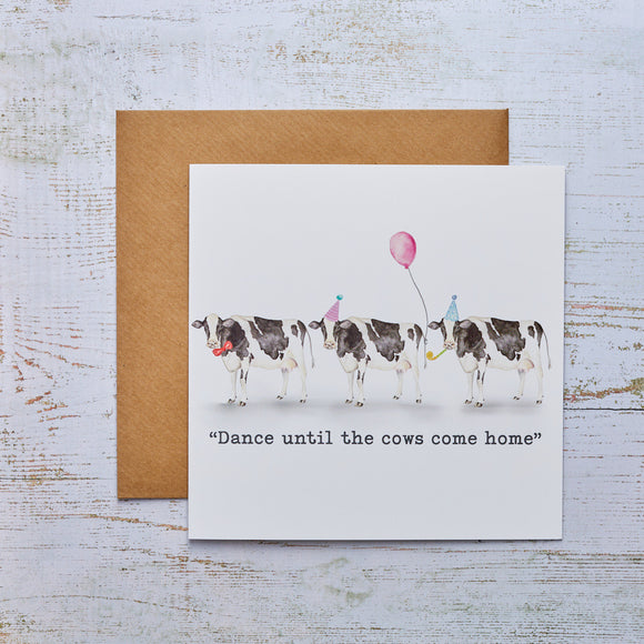 Vibrant 'Dance Until The Cows Come Home' card showcasing joyful bovine characters, a lively and cheerful option for various occasions.