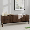 Wooden sideboard with decorative items in a modern living room setting