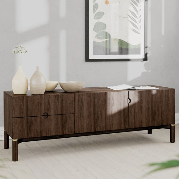 Wooden sideboard with decorative items in a modern living room setting