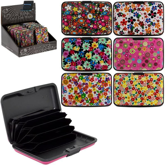 The Floral Credit Card Holder Assortment is a set of stylish and practical card holders designed to keep your credit cards organized and protected. This assortment features a variety of vibrant floral patterns, adding a touch of elegance and femininity to your everyday essentials. With multiple card slots and a compact size, these holders are perfect for carrying your cards while on the go. Stay organized and stylish with this delightful assortment of floral credit card holders.