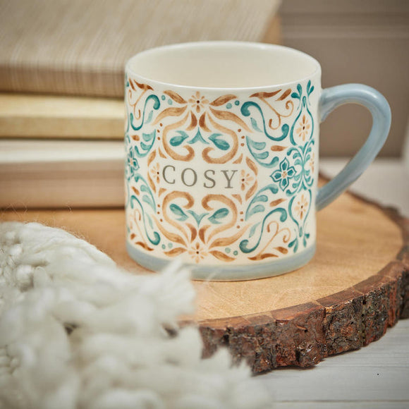 An image of the Scroll Cosy Mug showcasing its elegant scroll design, perfect for sipping your favorite beverages in style.