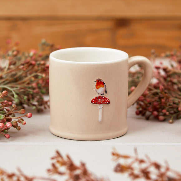 Robin Mug - A charming robin-themed stoneware mug, perfect for sipping your favorite beverages with a touch of whimsy.