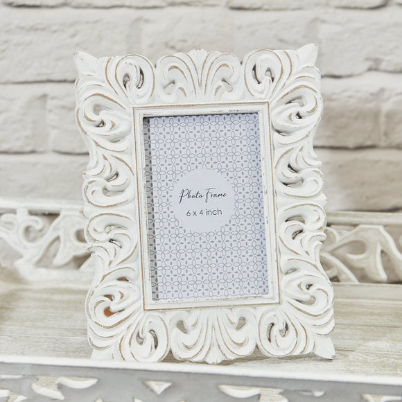 Timeless Elegance in Home Decor: The Exquisite Handcrafted White Carved Frame, a Stunning Addition to Your Living Space.