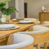 Cofra Danu dining chair in neutral fabric on a natural oak frame