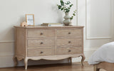 Experience the allure of French design with the Camille 6 Drawer Wide Chest, offering ample storage and elegant curves.
