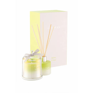A captivating visual of the "Wild Pear And Freesia Gift Set" showcasing its scented candle and diffuser.