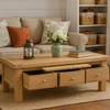 Wooden coffee table with decorative items in a living room setting