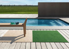 Brink & Campman Deck Outdoor Rug Spring Green lifestyle picture near the swimming pool