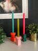 Colorful holder for candlestick with geometric design

