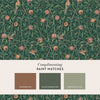 Classic Morris design on deep green wallpaper with terracotta and rosey pink accents