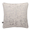Luxurious dimensional cushion in cream and silver hues.