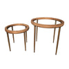Alana set of two round side tables with clear glass tops, wood-tone frames and tapered legs
