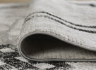 Alisa Geometric Rug Grey Black picture of the bordered end and pcut pile