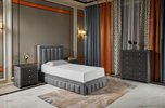 Modern ottoman bed frame in plush grey fabric
