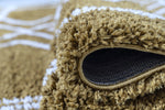 Ashton Geometric Rug 04 Mustard Cream picture of the border and shaggy pile height