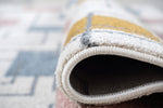 Aspire Geometric Rug Coral close view picture of the border and pile height