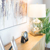 Ava Table Lamp illuminating table