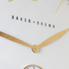 Baker and Brown Clock White/Brass 72 cm close view picture of the brass arrows