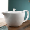 Belleek Living Erne Teapot on a wooden table